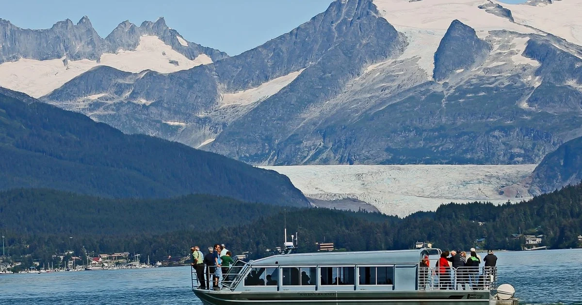 Whale watching boat tour from a cold-weather cruise port